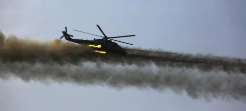 Máy bay trực thăng tấn công Mi-35 tiến hành tấn công đối đất